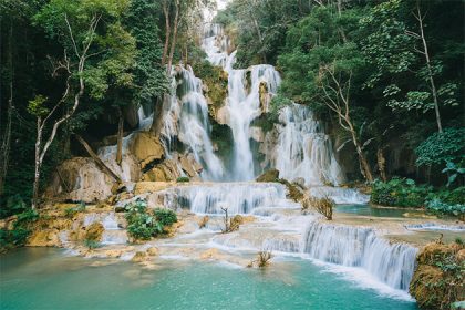 enjoy stunning Kuang Si Falls from Laos trip
