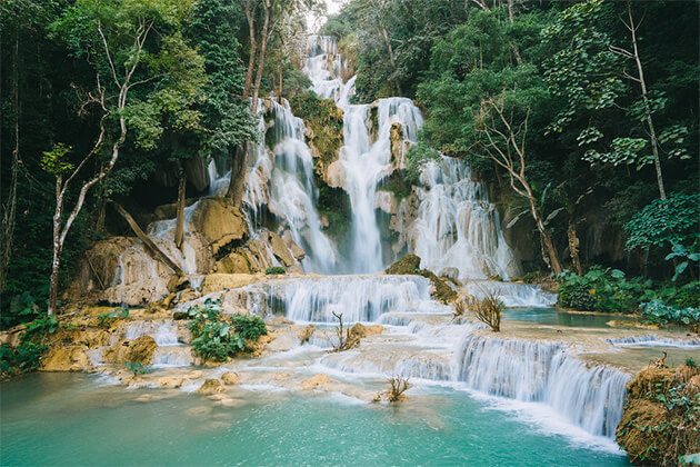 enjoy stunning Kuang Si Falls from Laos trip