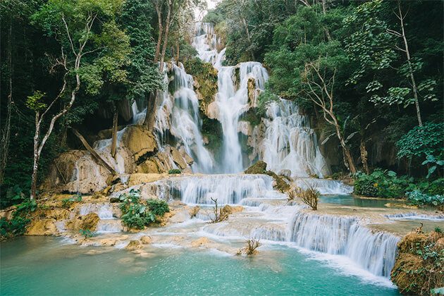 enjoy stunning Kuang Si Falls from Laos trip