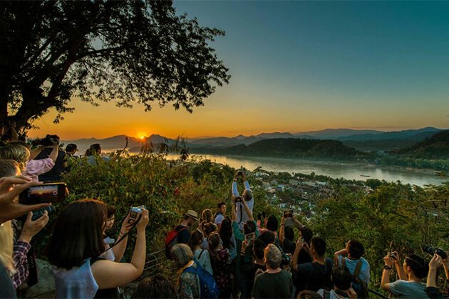 enjoy sunset view at phousi mount from Luang Prabng Laos trip